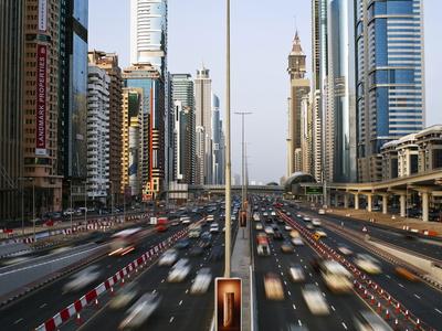 https://imgc.allpostersimages.com/img/posters/traffic-and-new-high-rise-buildings-along-sheikh-zayed-road-dubai-united-arab-emirates_u-L-PHBVMQ0.jpg?artPerspective=n