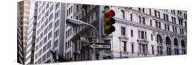 Traffic Light in Front of a Building, Wall Street, New York, USA-null-Stretched Canvas