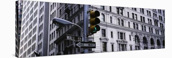 Traffic Light in Front of a Building, Wall Street, New York, USA-null-Stretched Canvas