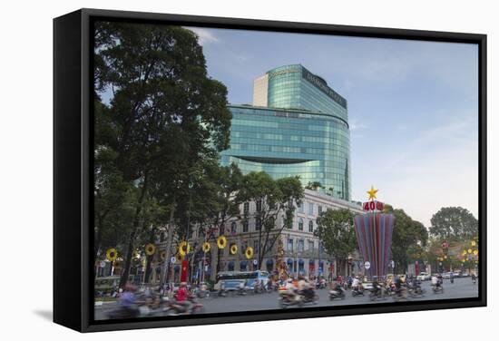 Traffic Passing Diamond Plaza, Ho Chi Minh City, Vietnam, Indochina, Southeast Asia, Asia-Ian Trower-Framed Stretched Canvas