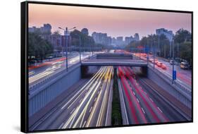 Traffic trail lights on major road near Beijing Zoo at dusk, Beijing-Frank Fell-Framed Stretched Canvas