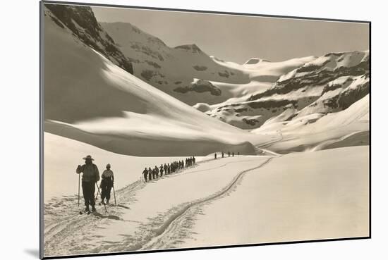 Trail of Cross-Country Skiers-null-Mounted Art Print