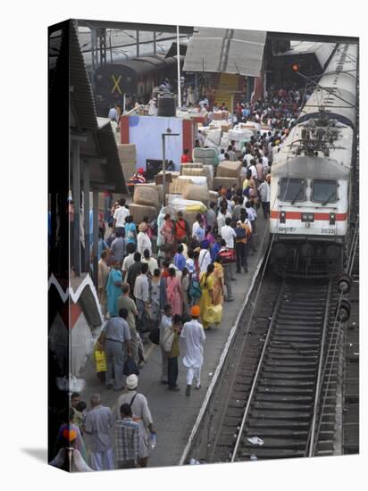 Train Ariving at Crowded Platform in New Delhi Train Station, Delhi, India-Eitan Simanor-Stretched Canvas