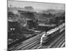 Train Moving Past Trackside Tenement Slums of Chicago-Gordon Coster-Mounted Photographic Print