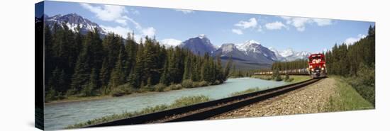 Train on a Railroad Track, Morant's Curve, Banff National Park, Alberta, Canada-null-Stretched Canvas