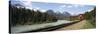 Train on a Railroad Track, Morant's Curve, Banff National Park, Alberta, Canada-null-Stretched Canvas