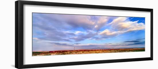 Train passing through a desert, New Mexico, USA-null-Framed Photographic Print