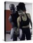 Trainer Helping Young Woman Exercise with Weights-null-Stretched Canvas