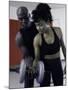 Trainer Helping Young Woman Exercise with Weights-null-Mounted Photographic Print