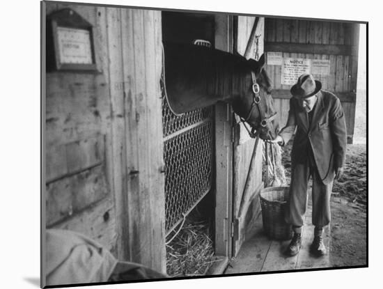 Trainer Jim Fitzsimons at Aqueduct Track Stables after William Woodward's Death in Stable-Grey Villet-Mounted Photographic Print