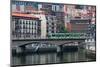 Tram Crossing the River Nervion in Bilbao, Biscay (Vizcaya), Basque Country (Euskadi)-Martin Child-Mounted Photographic Print