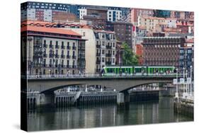 Tram Crossing the River Nervion in Bilbao, Biscay (Vizcaya), Basque Country (Euskadi)-Martin Child-Stretched Canvas