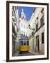 Tram (Electricos) Along Rua Das Escolas Gerais with Tower of Sao Vicente de Fora, Lisbon, Portugal-Stuart Black-Framed Photographic Print