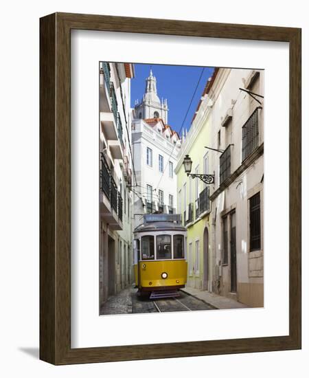 Tram (Electricos) Along Rua Das Escolas Gerais with Tower of Sao Vicente de Fora, Lisbon, Portugal-Stuart Black-Framed Photographic Print