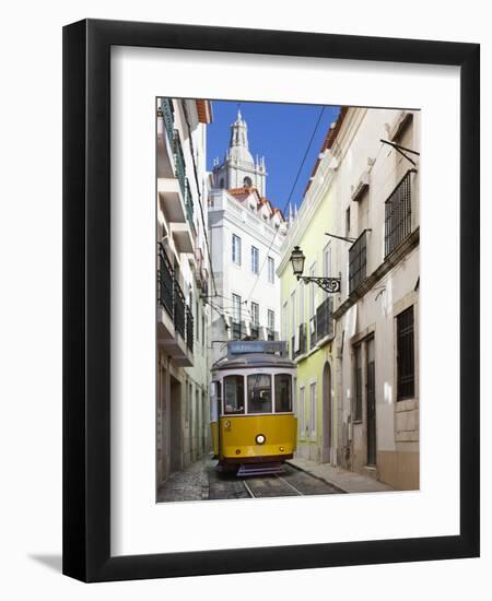 Tram (Electricos) Along Rua Das Escolas Gerais with Tower of Sao Vicente de Fora, Lisbon, Portugal-Stuart Black-Framed Photographic Print