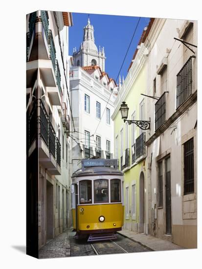 Tram (Electricos) Along Rua Das Escolas Gerais with Tower of Sao Vicente de Fora, Lisbon, Portugal-Stuart Black-Stretched Canvas