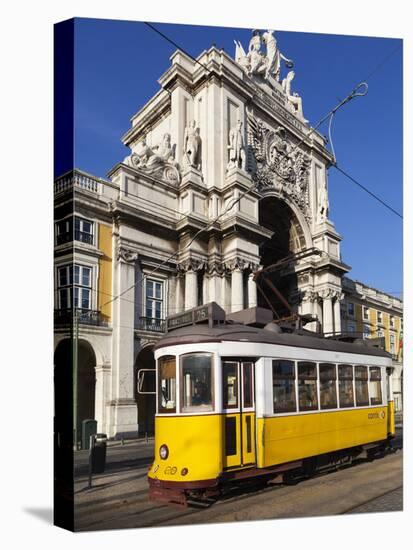 Tram (Electricos) Below the Arco Da Rua Augusta in Praca Do Comercio, Baixa, Lisbon, Portugal-Stuart Black-Stretched Canvas