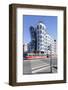 Tram in Front of the Dancing House (Ginger and Fred) by Frank Gehry-Markus Lange-Framed Photographic Print