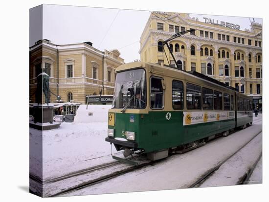 Tram in Street in Winter, Helsinki, Finland, Scandinavia-Gavin Hellier-Stretched Canvas