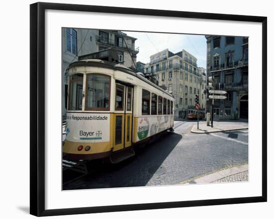 Tram in the Baixa District, Lisbon, Portugal-Neale Clarke-Framed Photographic Print