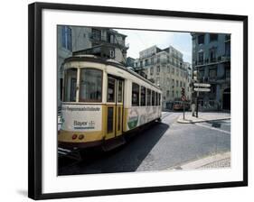 Tram in the Baixa District, Lisbon, Portugal-Neale Clarke-Framed Photographic Print