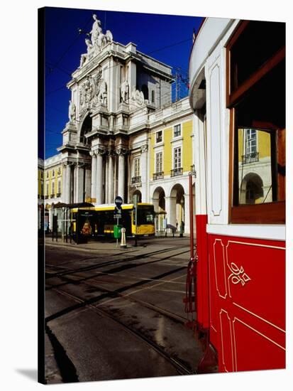 Tram on Praca De Commercio, Lisbon, Portugal-Izzet Keribar-Stretched Canvas