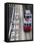 Tram Passing Along Des Voeux Road Central, Central, Hong Kong, China-Ian Trower-Framed Stretched Canvas