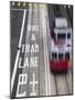 Tram Passing Along Des Voeux Road Central, Central, Hong Kong, China-Ian Trower-Mounted Photographic Print