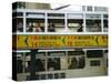 Tram Passing Pick up Stop, Hong Kong, China, Asia-Fraser Hall-Stretched Canvas