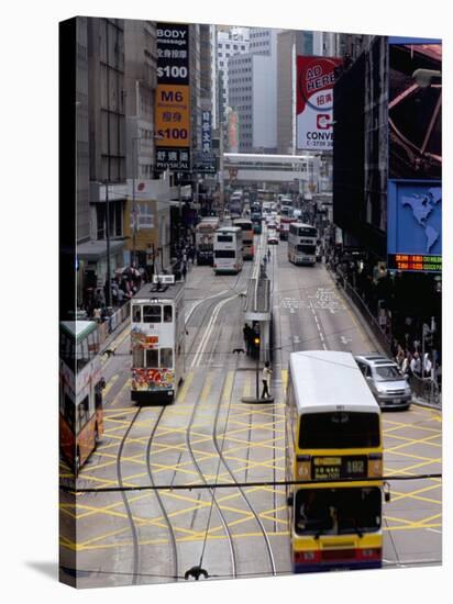 Trams, Des Voeux Road, Central, Hong Kong Island, Hong Kong, China-Amanda Hall-Stretched Canvas