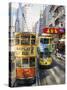 Trams in Wan Chai (Wanchai), Hong Kong, China-Charles Bowman-Stretched Canvas