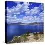 Tranquil Lake Against Cloudy Sky, Sardinia, Italy-null-Stretched Canvas