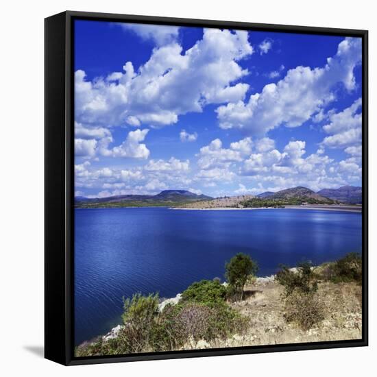 Tranquil Lake Against Cloudy Sky, Sardinia, Italy-null-Framed Stretched Canvas