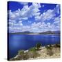 Tranquil Lake Against Cloudy Sky, Sardinia, Italy-null-Stretched Canvas