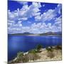 Tranquil Lake Against Cloudy Sky, Sardinia, Italy-null-Mounted Photographic Print