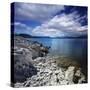 Tranquil Lake and Rocky Shore Against Cloudy Sky, Sardinia, Italy-null-Stretched Canvas