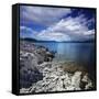 Tranquil Lake and Rocky Shore Against Cloudy Sky, Sardinia, Italy-null-Framed Stretched Canvas