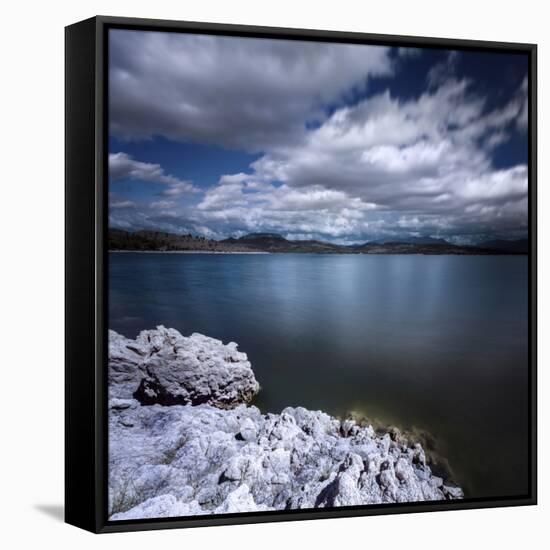 Tranquil Lake and Rocky Shore Against Cloudy Sky, Sardinia, Italy-null-Framed Stretched Canvas