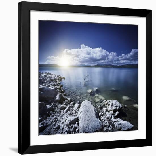 Tranquil Lake and Rocky Shore with Sun over Horizon, Sardinia, Italy-null-Framed Photographic Print