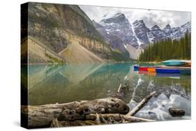 Tranquil setting of rowing boats on Moraine Lake, Banff National Park, UNESCO World Heritage Site, -Frank Fell-Stretched Canvas