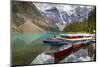 Tranquil setting of rowing boats on Moraine Lake, Banff National Park, UNESCO World Heritage Site,-Frank Fell-Mounted Photographic Print