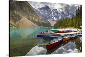 Tranquil setting of rowing boats on Moraine Lake, Banff National Park, UNESCO World Heritage Site,-Frank Fell-Stretched Canvas