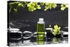 Tranquil Spa Scene - Massage Oil and Candle on Black Stones with Green Orchid-crystalfoto-Stretched Canvas