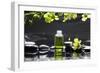 Tranquil Spa Scene - Massage Oil and Candle on Black Stones with Green Orchid-crystalfoto-Framed Photographic Print