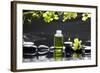 Tranquil Spa Scene - Massage Oil and Candle on Black Stones with Green Orchid-crystalfoto-Framed Photographic Print