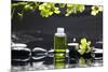 Tranquil Spa Scene - Massage Oil and Candle on Black Stones with Green Orchid-crystalfoto-Mounted Photographic Print