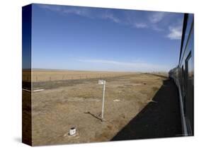 Trans-Mongolian Train Travelling Through the Gobi Desert En Route to Ulaan Baatar, Mongolia-Andrew Mcconnell-Stretched Canvas