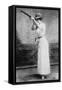Trapshooting Woman with Shotgun Photograph-Lantern Press-Framed Stretched Canvas