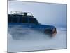 Travelers Drive over a Flooded Salt Flat in Bolivia-Sergio Ballivian-Mounted Photographic Print