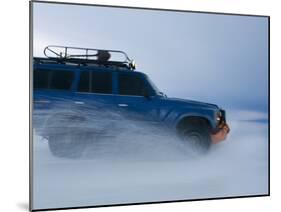 Travelers Drive over a Flooded Salt Flat in Bolivia-Sergio Ballivian-Mounted Photographic Print